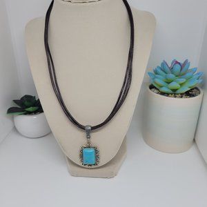 3 Strand Distressed Leather Necklace with Turquoise Pendant with scroll detail